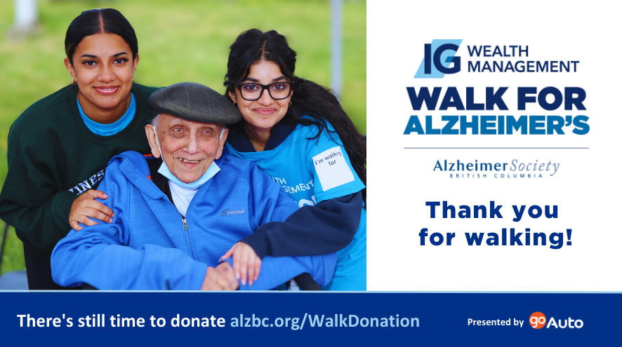 Three people in a group photograph. Two younger people standing crouched over behind an older person sitting down. Text on the right of the image reads Walk for Alzheimer's. Who will you walk for? Sunday May 28. At the bottom of the image it reads, register and fundraise at walkforalzheimers.ca