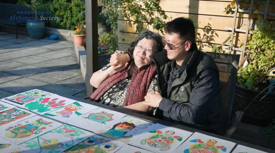 Caregiver Eric Li and his mother in LTC