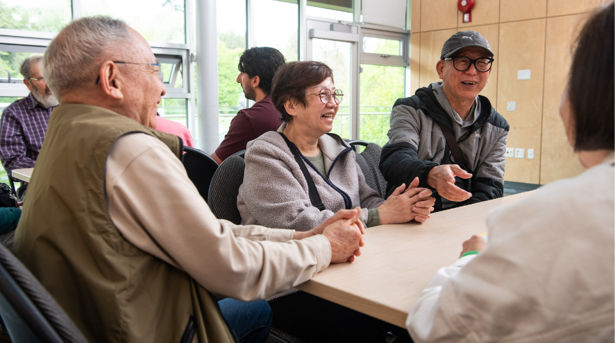 a group of adults chatting
