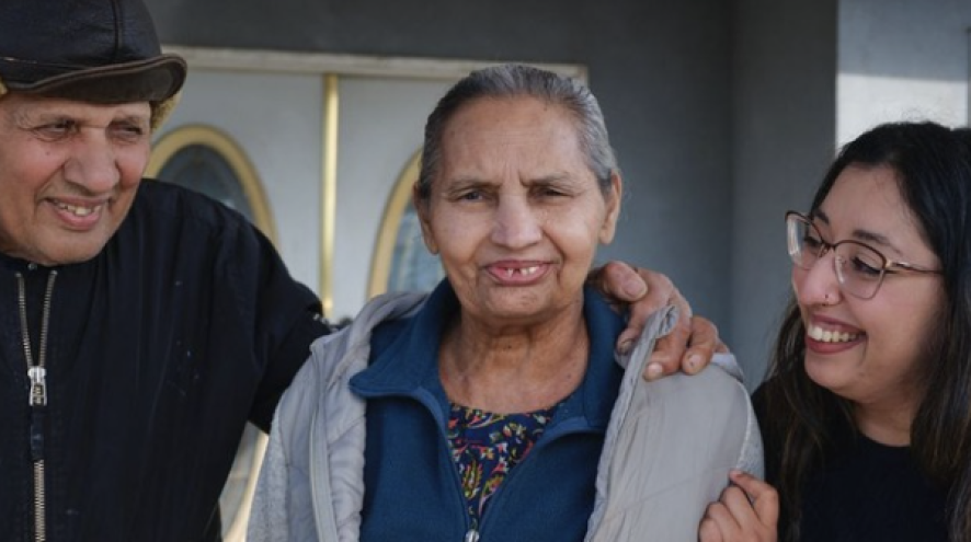 A family smiling at the camera