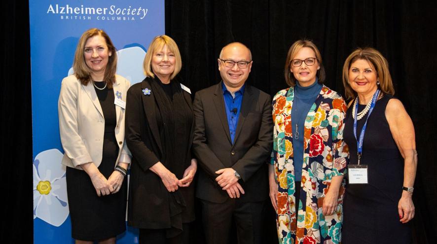 (Above, from left) Alzheimer Society of B.C. CEO Maria Howard; Cathryn France, director of the Society’s Resource Development department; keynote speaker Dr. Roger Wong, world-leading geriatrician; Dawna Friesen, Global National anchor and emcee of the event; and guest speaker Caren McSherry, founder and CEO of The Gourmet Warehouse pose at Breakfast to Remember on March 7 at the Fairmont Waterfront in Vancouver.