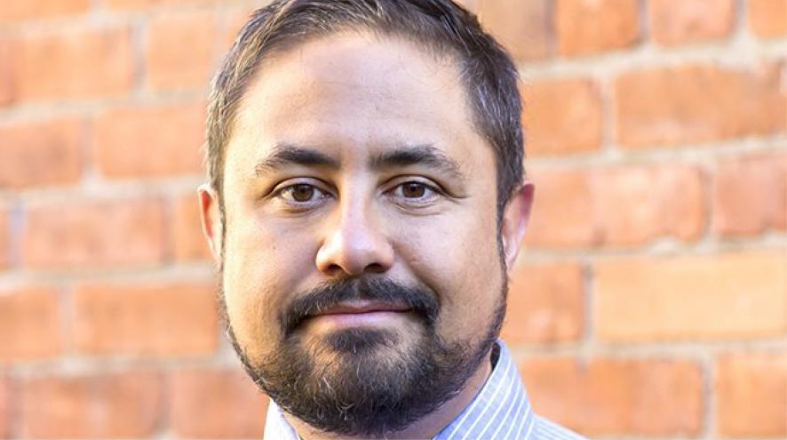 Dr. Alexandre Henri-Bhargava in a professional headshot.