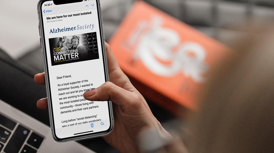 A person holding a phone reading an article