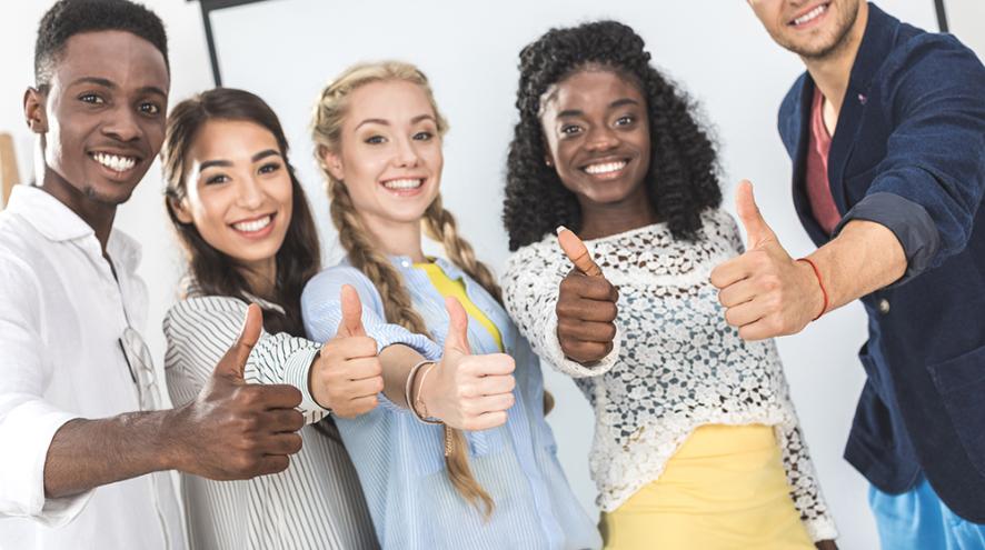 multi-ethnic youth giving thumbs up