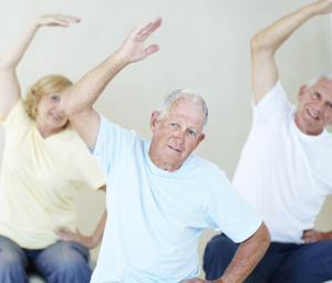 Minds in Motion participants doing some stretches.