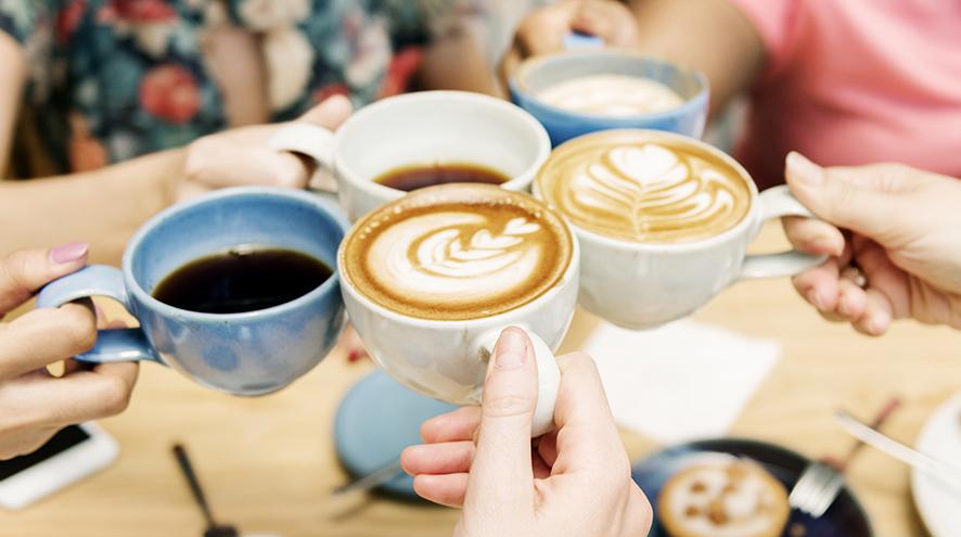 People having coffee together.