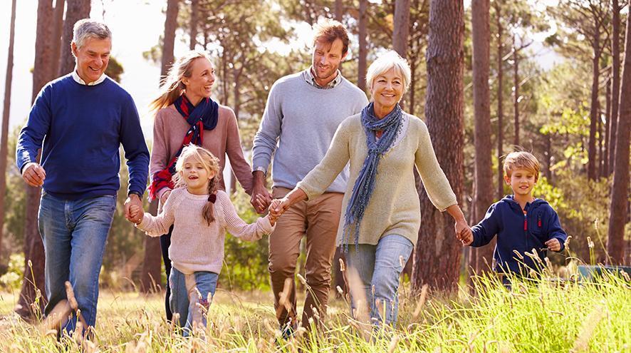 family-taking-a-hike-through-the-woods