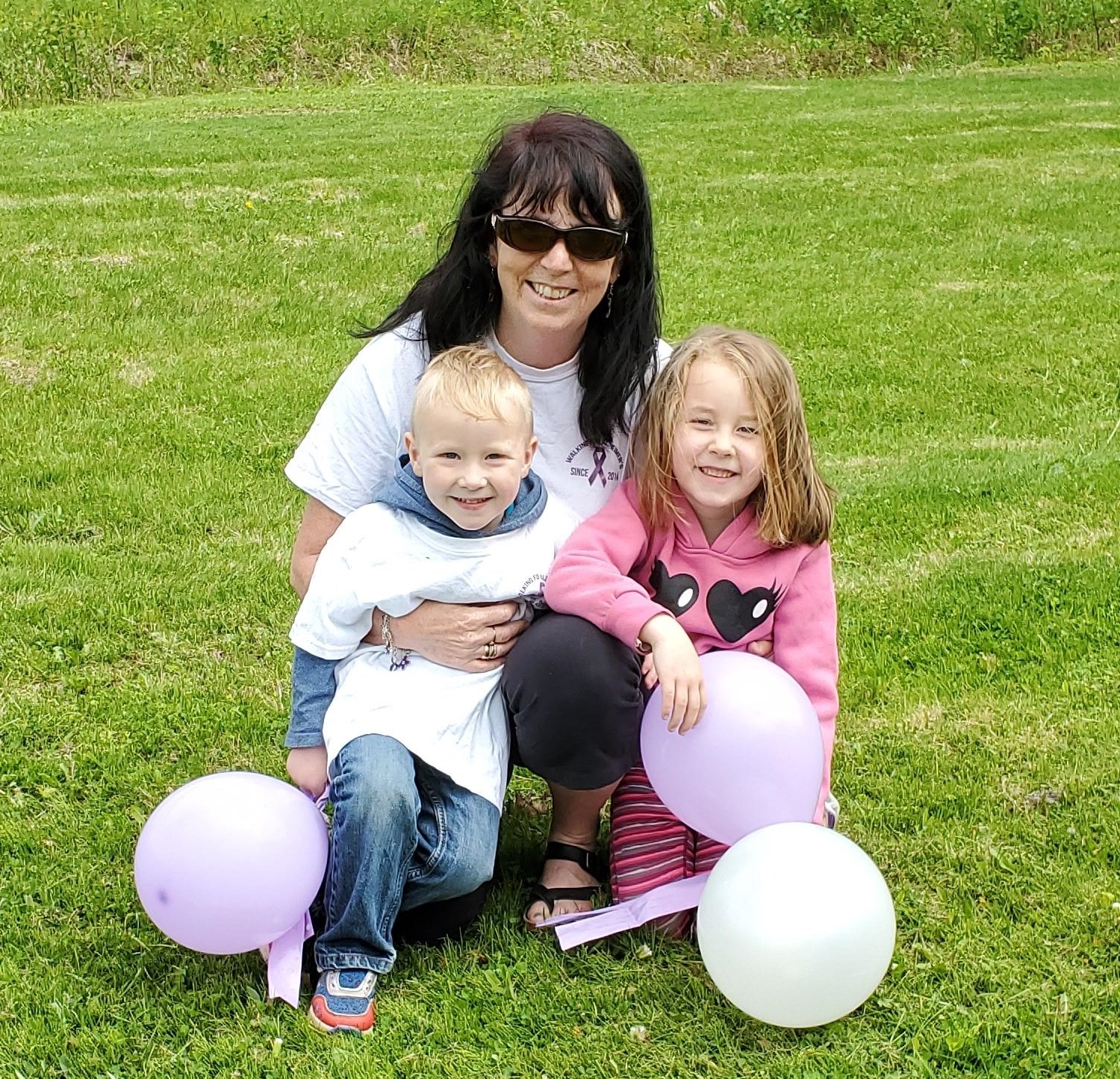 Shelly and her 2 grandchildren participating in the Walk