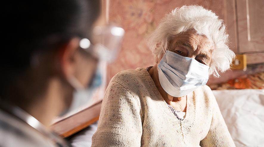 Senior woman wearing mask.