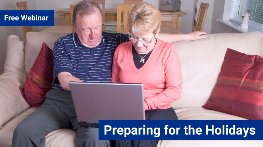 Man and woman on couch using laptop