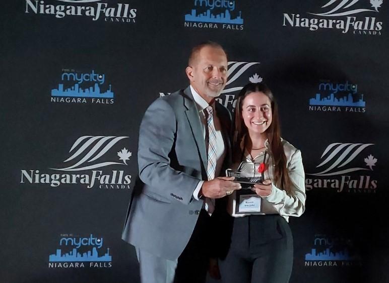 Bianca receiving award