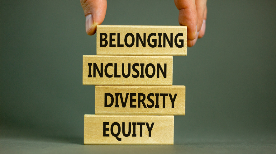 Building blocks with the words "Belonging," "Inclusion," "Diversity," and "Equity" written on them