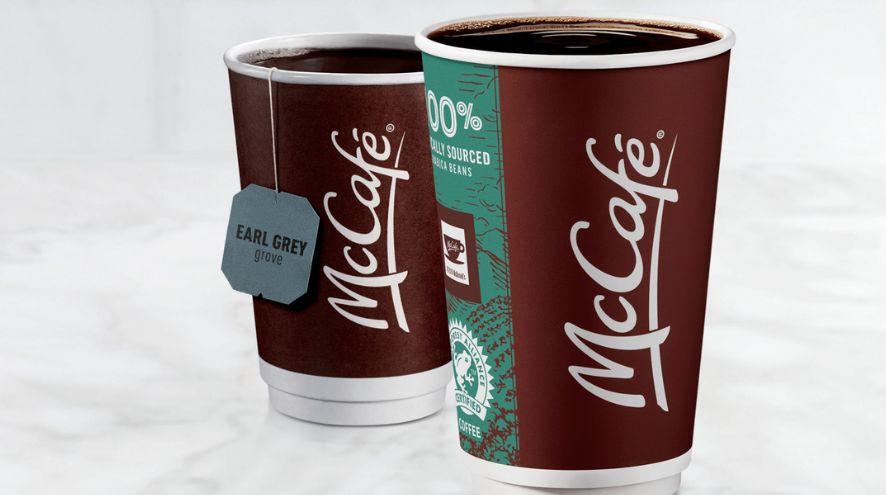a cup of coffee and a cup of tea in mcdonalds coffee cups