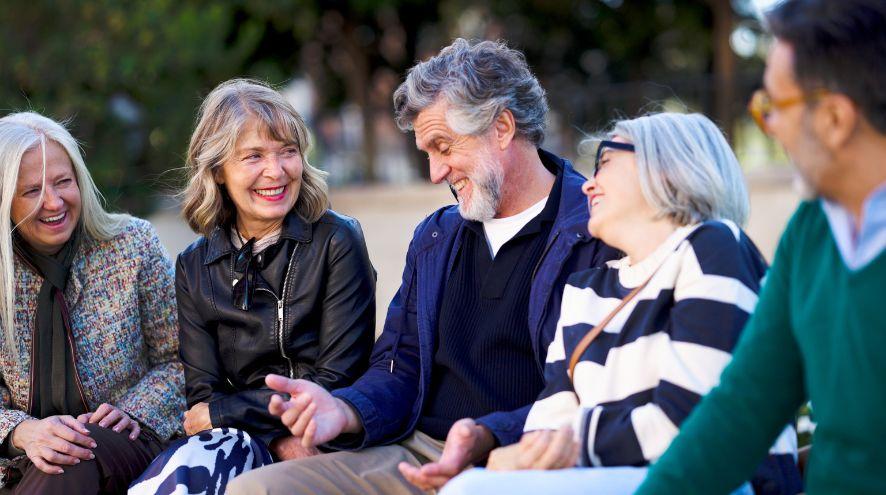 A group of people reminiscing and laughing