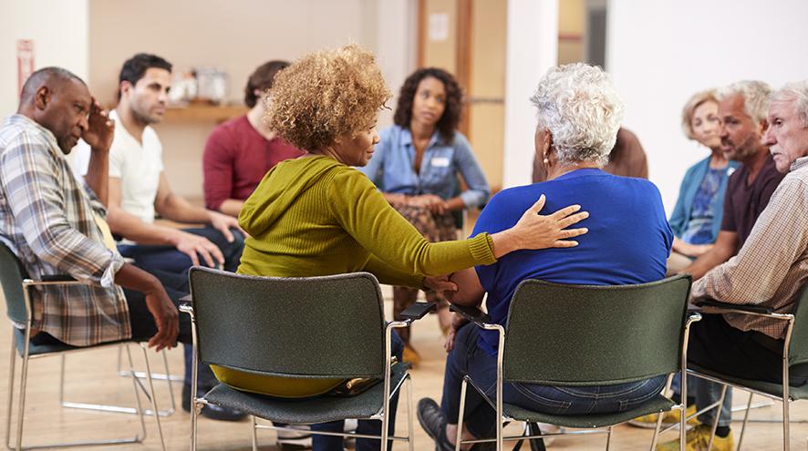Group of adults sitting in a circle