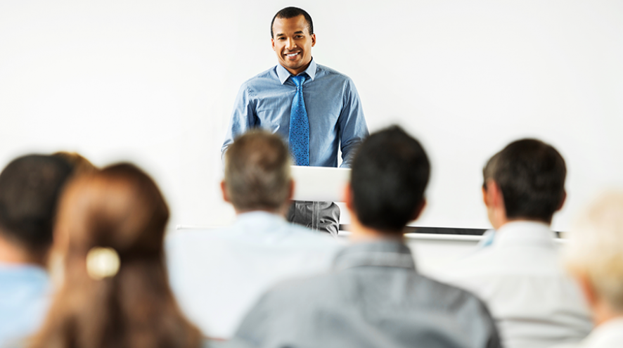 Man speaking to an audience