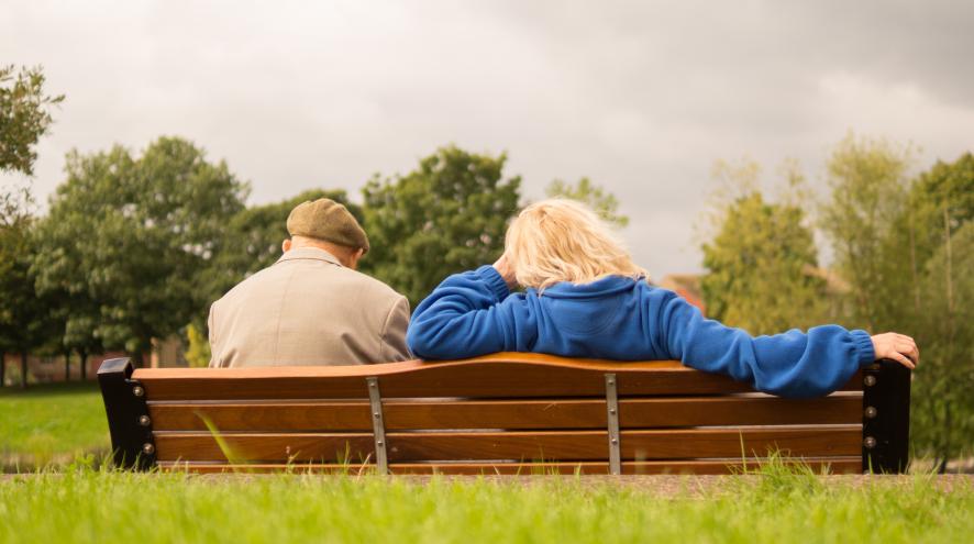 Couple resting on a bench