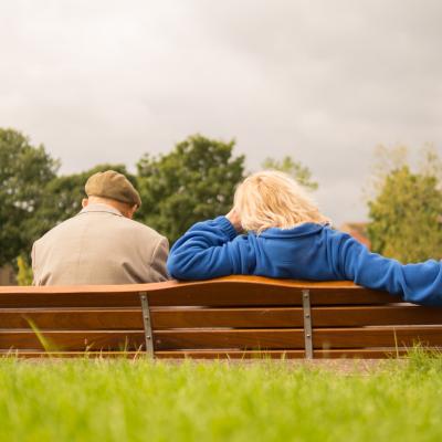 Couple resting on a bench