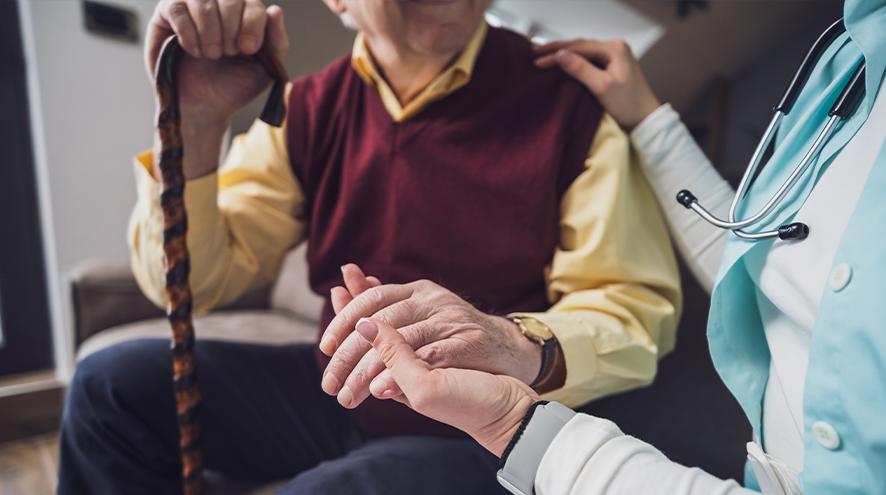Two people holding hands