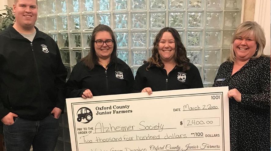 Junior Farmers presenting a check to the Alzheimer Society of Oxford.