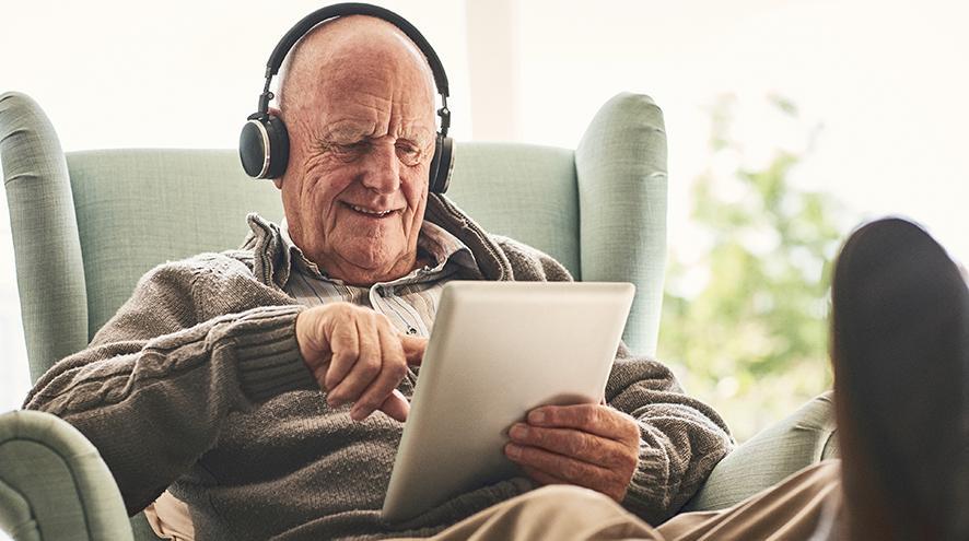 Man watching a video on a tablet