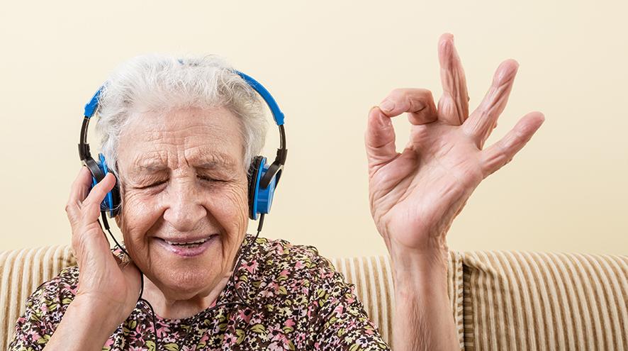 Senior woman listening to some good music.
