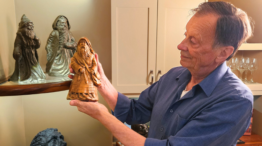Theo with wooden sculpture