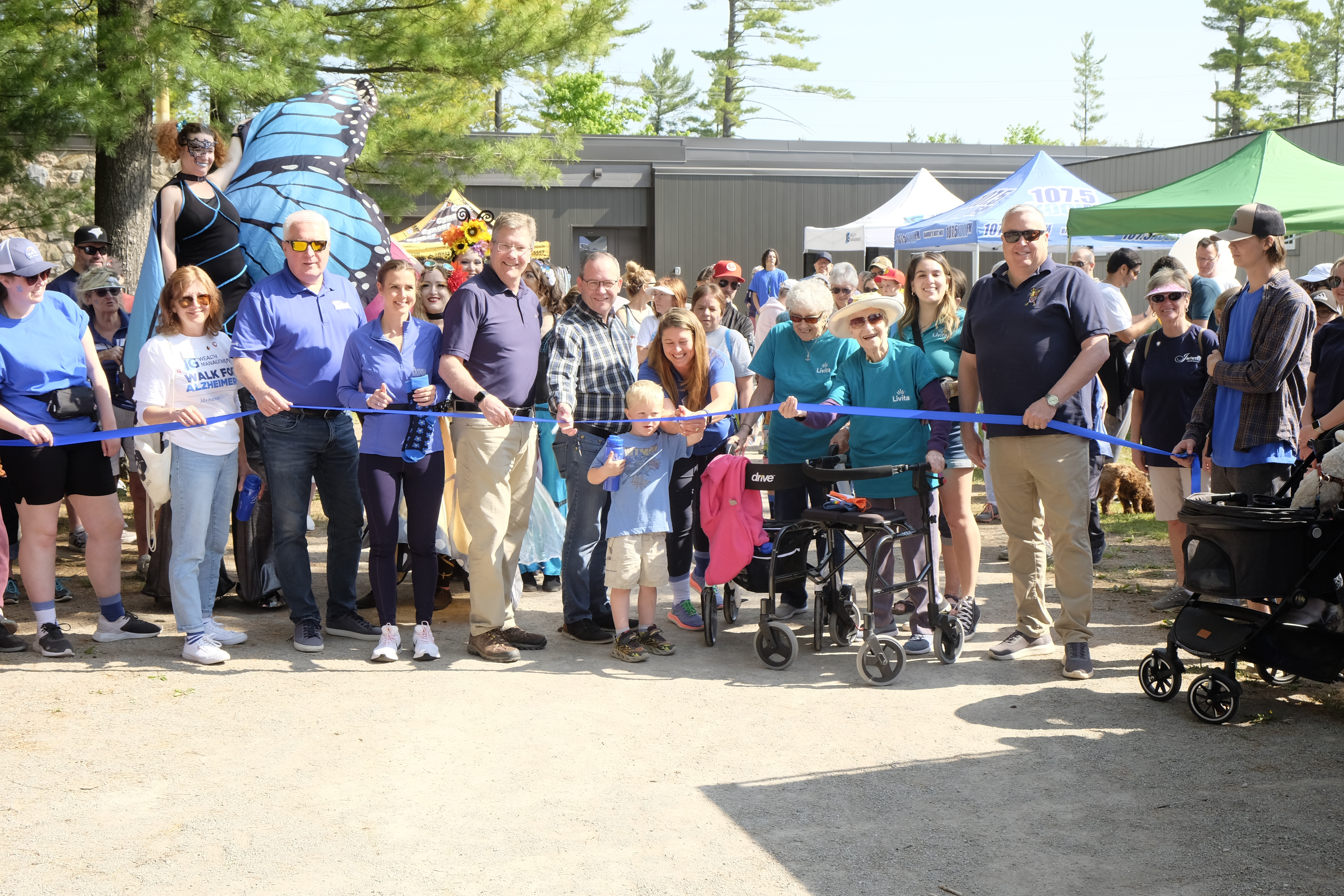 People gathered to cut ribbon