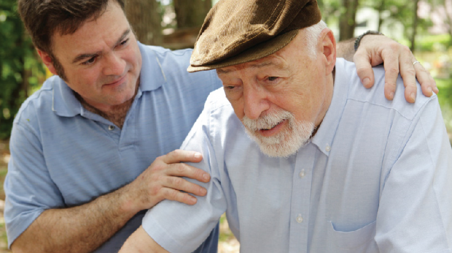 Son with his arm around his father