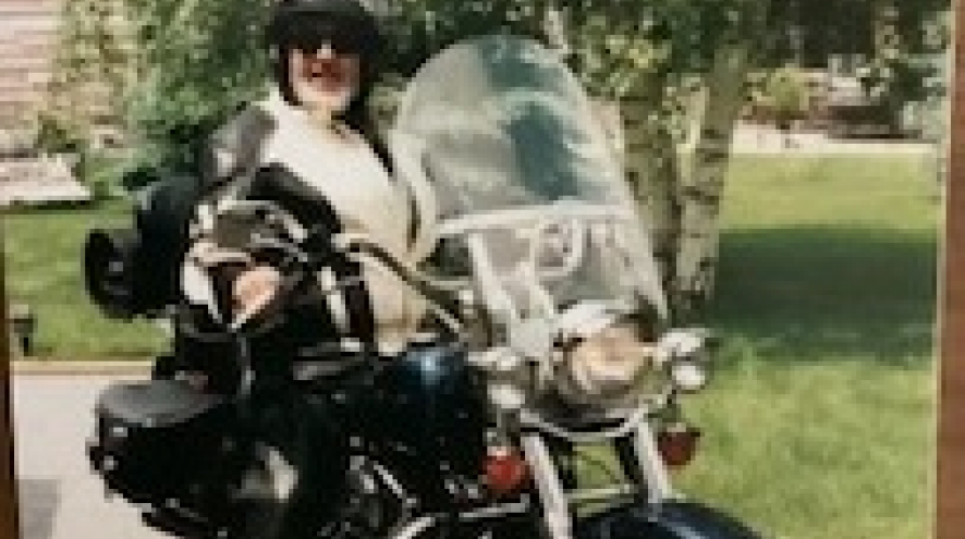 Older male on motorcycle