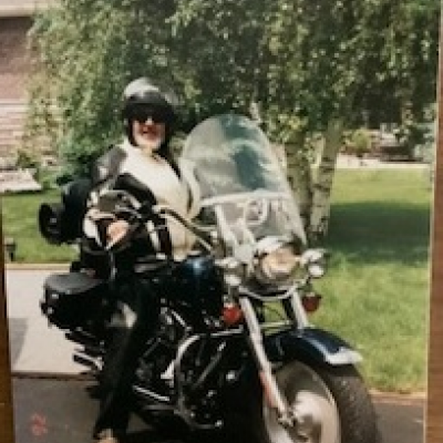 Older male on motorcycle