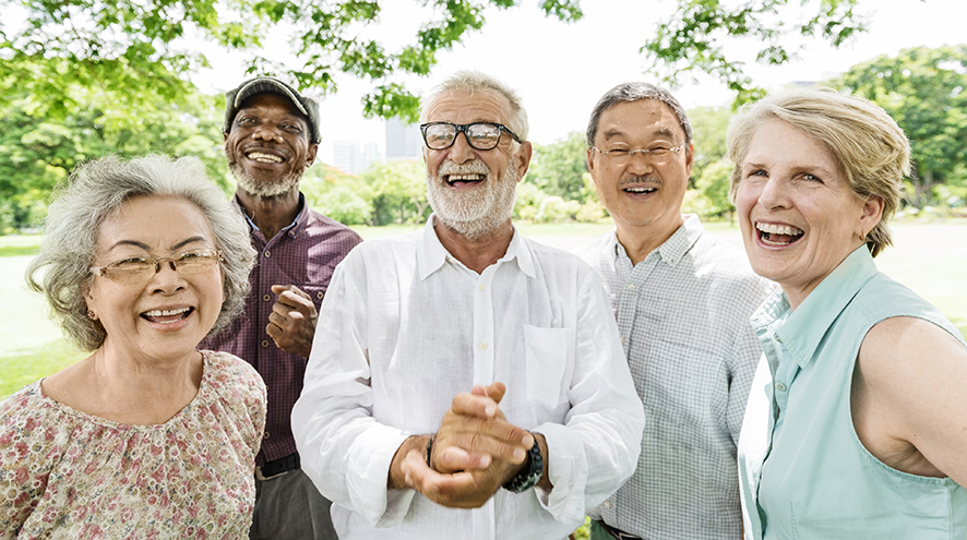 Group of happy seniors in the park.