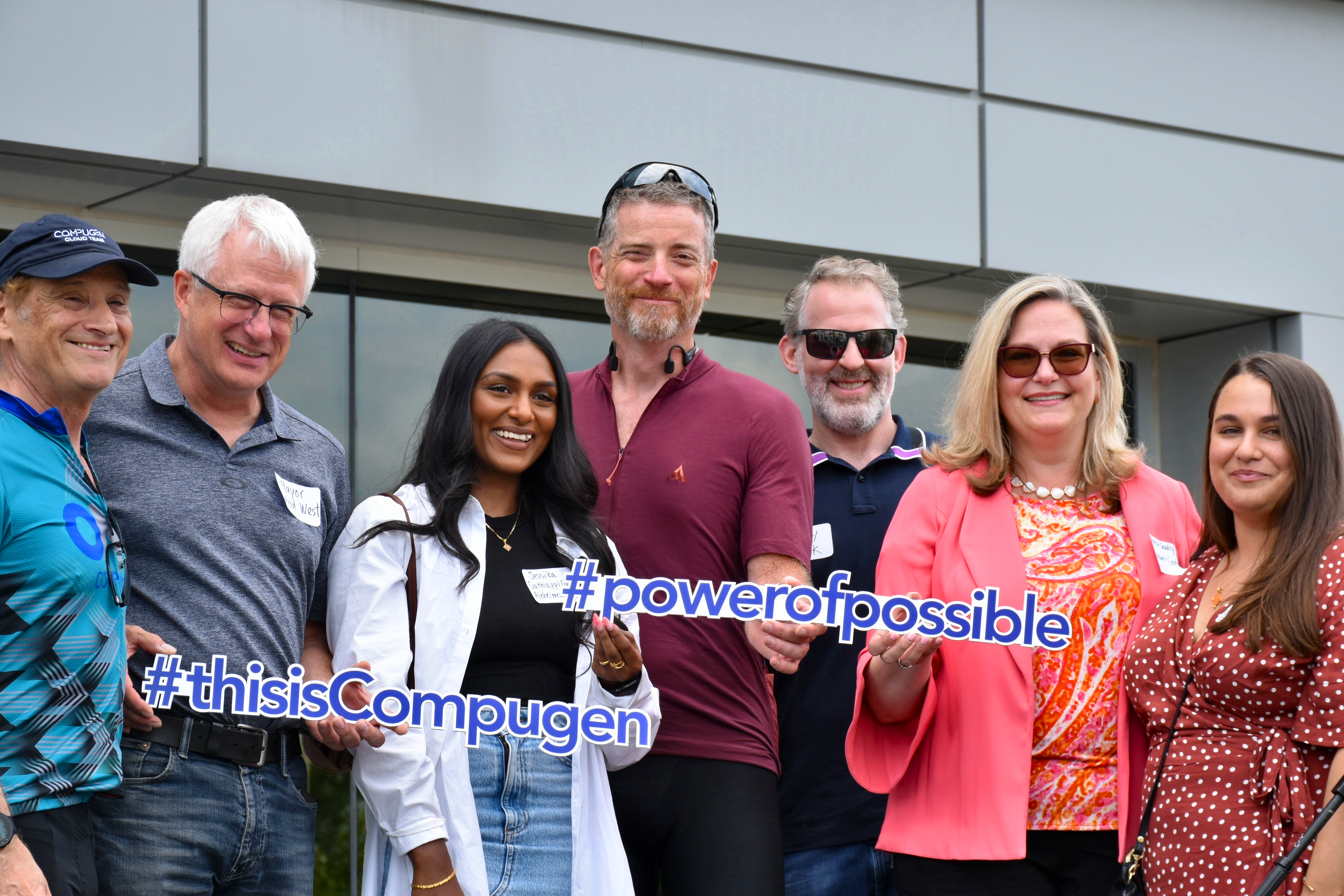 Julian celebrating the end of his cycle across Canada with Compugen and Alzheimer Society of Canada staff.