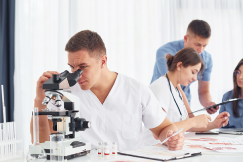 Group of young researchers in a lab