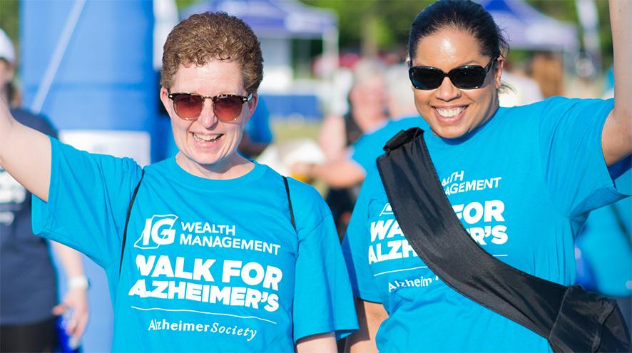 Two people participating in their local IG Wealth Management Walk for Alzheimer's.