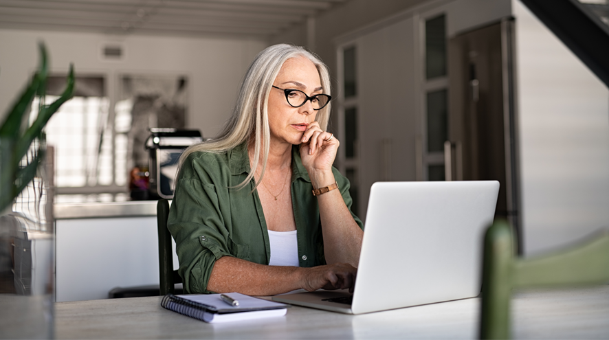 Older woman on laptop at home