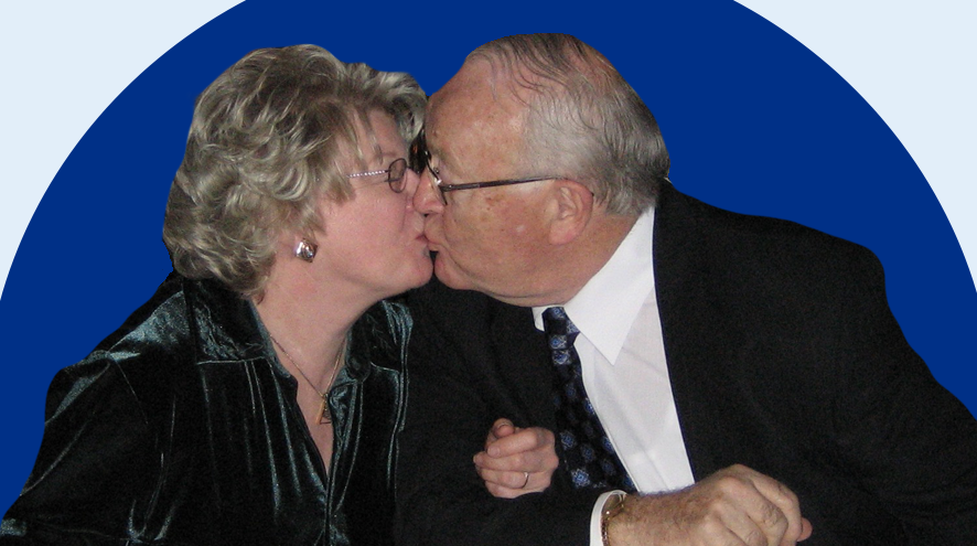 Barbara and Pat Tarrant, in a kiss.
