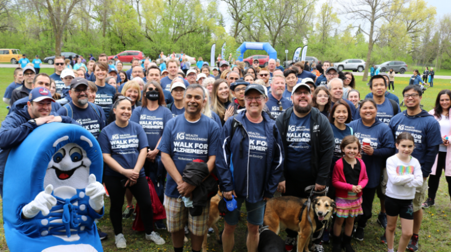 Group photo of people in IG Walk for Alzheimer's shirts