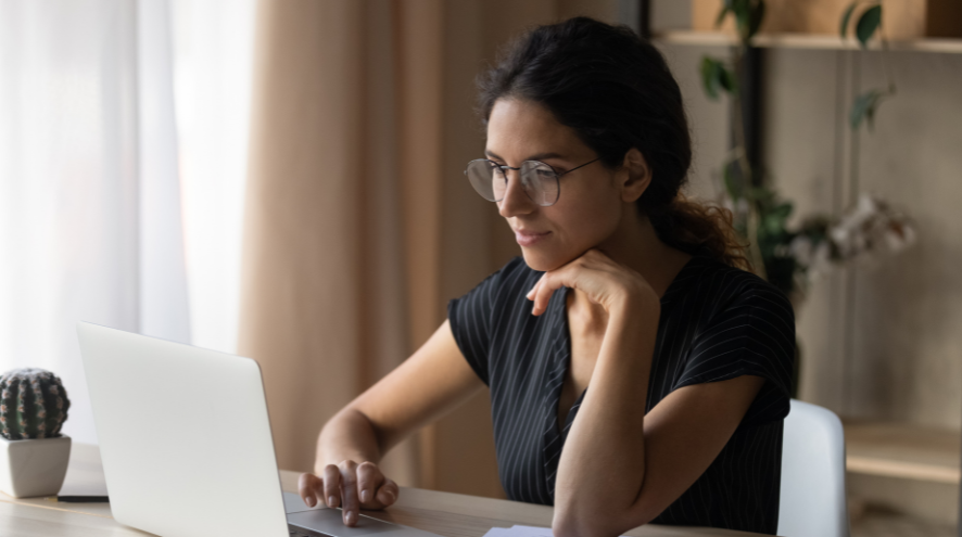 Woman looking at a laptop