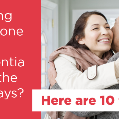 A smiling, middle-aged woman is embracing her father. The text, "Visiting someone with dementia over the holidays? Here are 10 tips" can be read next to the woman.