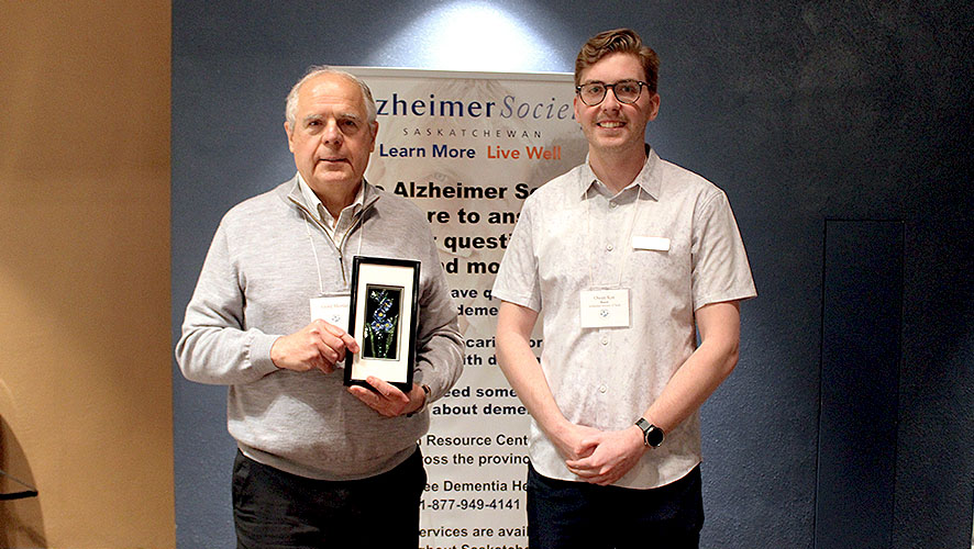 Gord Mertler receiving his Philanthropic Leadership Award
