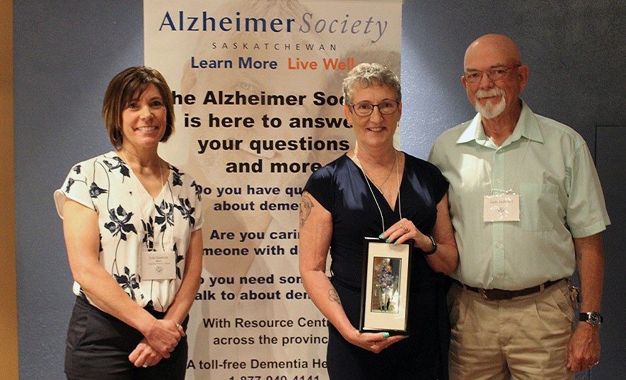 Garth and Rhondda Halkyard receiving their Volunteerism Award