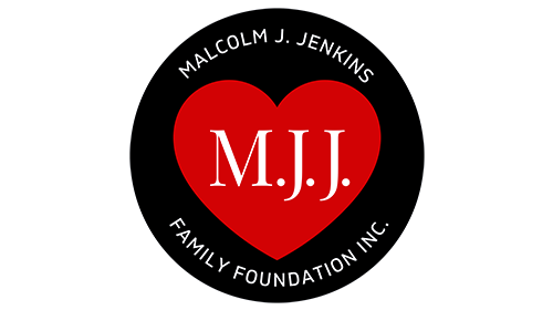A black circle with a red heart in the middle with the letters, "M.J.J." Above and below the heart there is white text that says, "Malcolm J Jenkins Family Foundation."