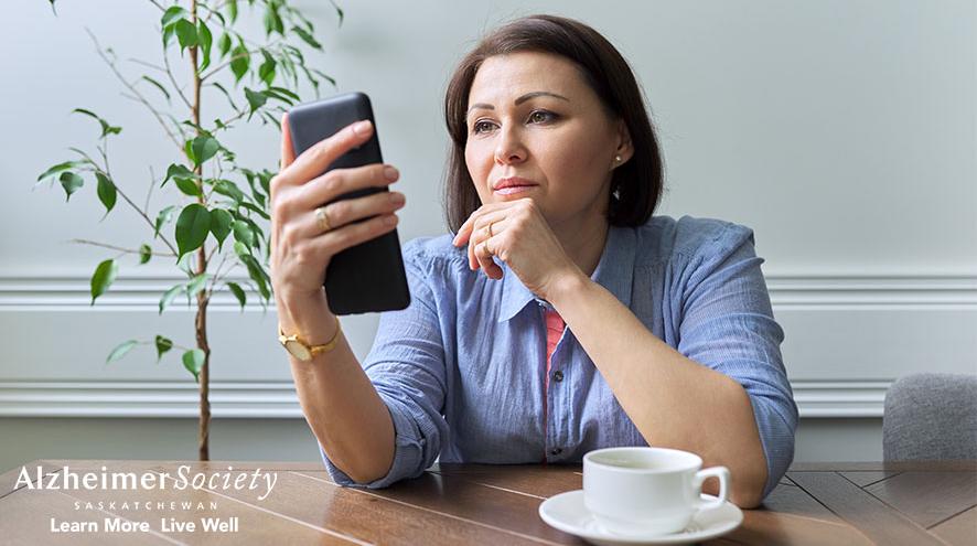 A woman researching on her phone.