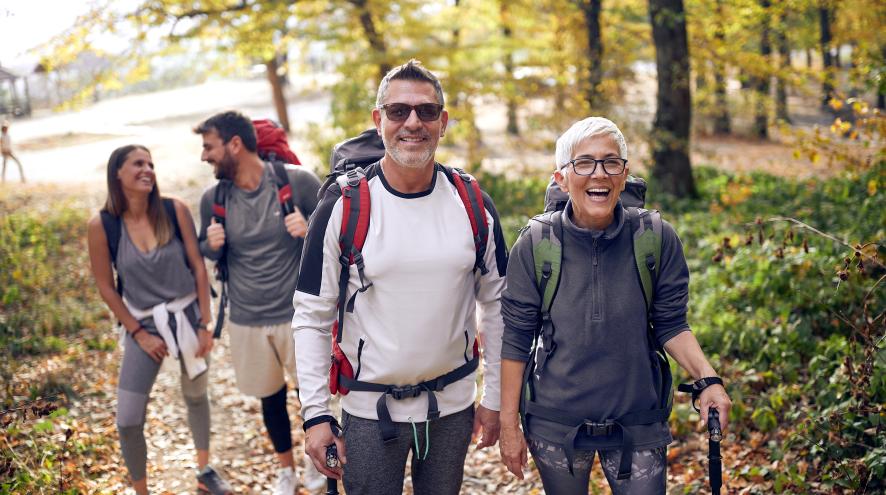 two couples walking