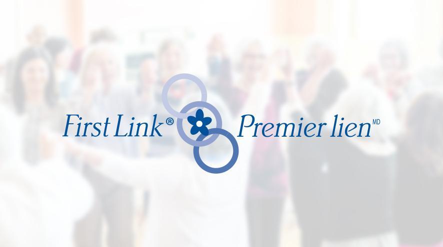 First Link logo with people faintly seen in the background.