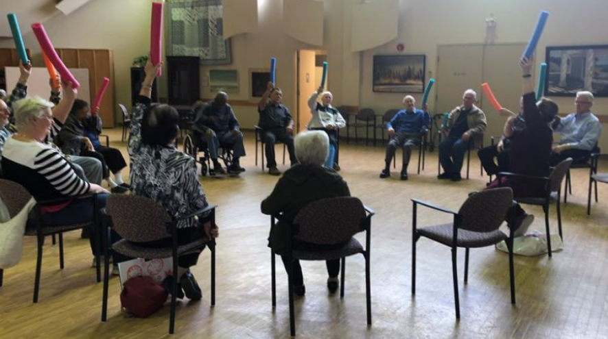 Clients at the Stouffville DAY program participating at chair exercises.