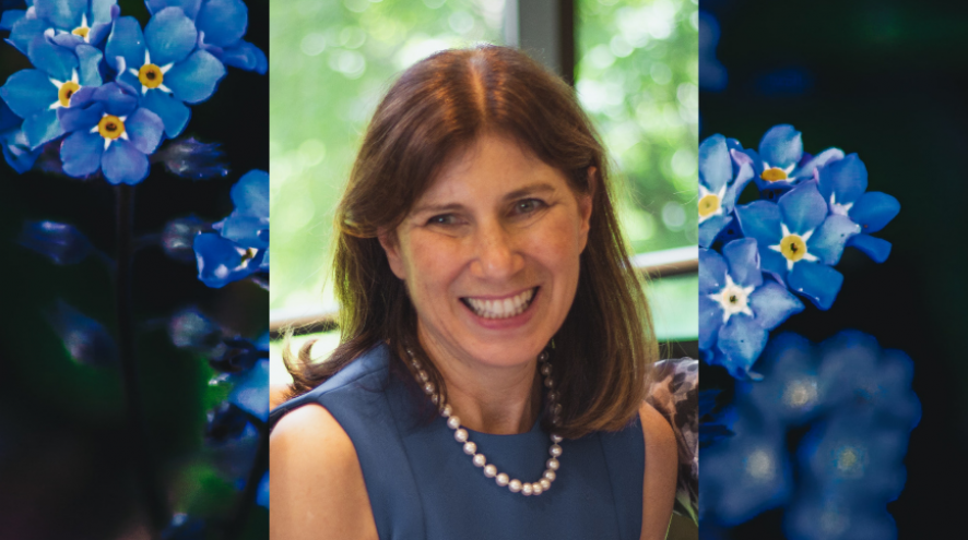 Head and shoulder shot of Dr. Sharon Cohen from the Toronto Memory Program on top of a forget-me-not flower background. 