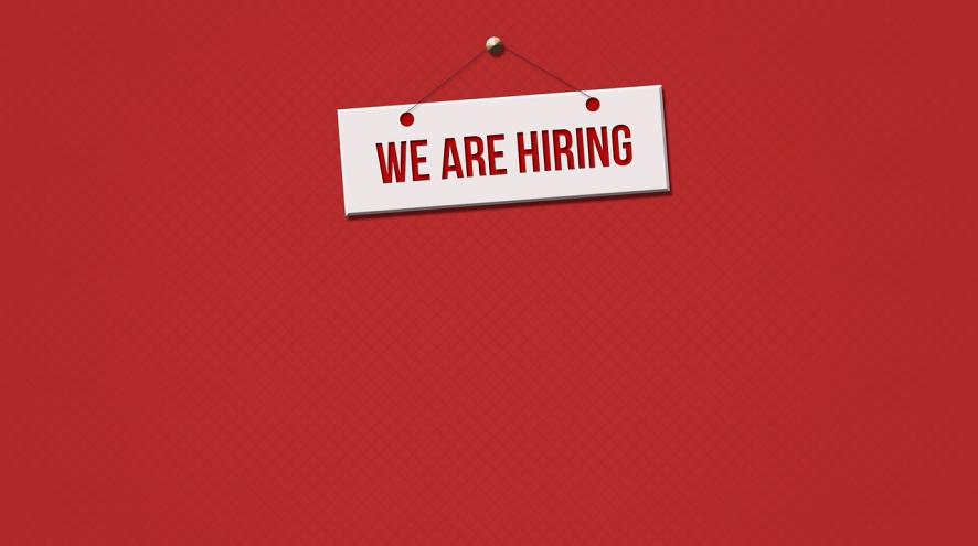 Words We are Hiring on a red background
